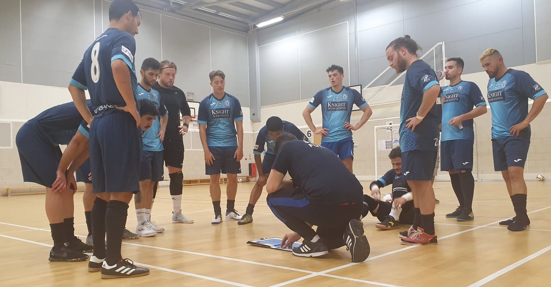 Sussex Futsal squad during a tactical team talk